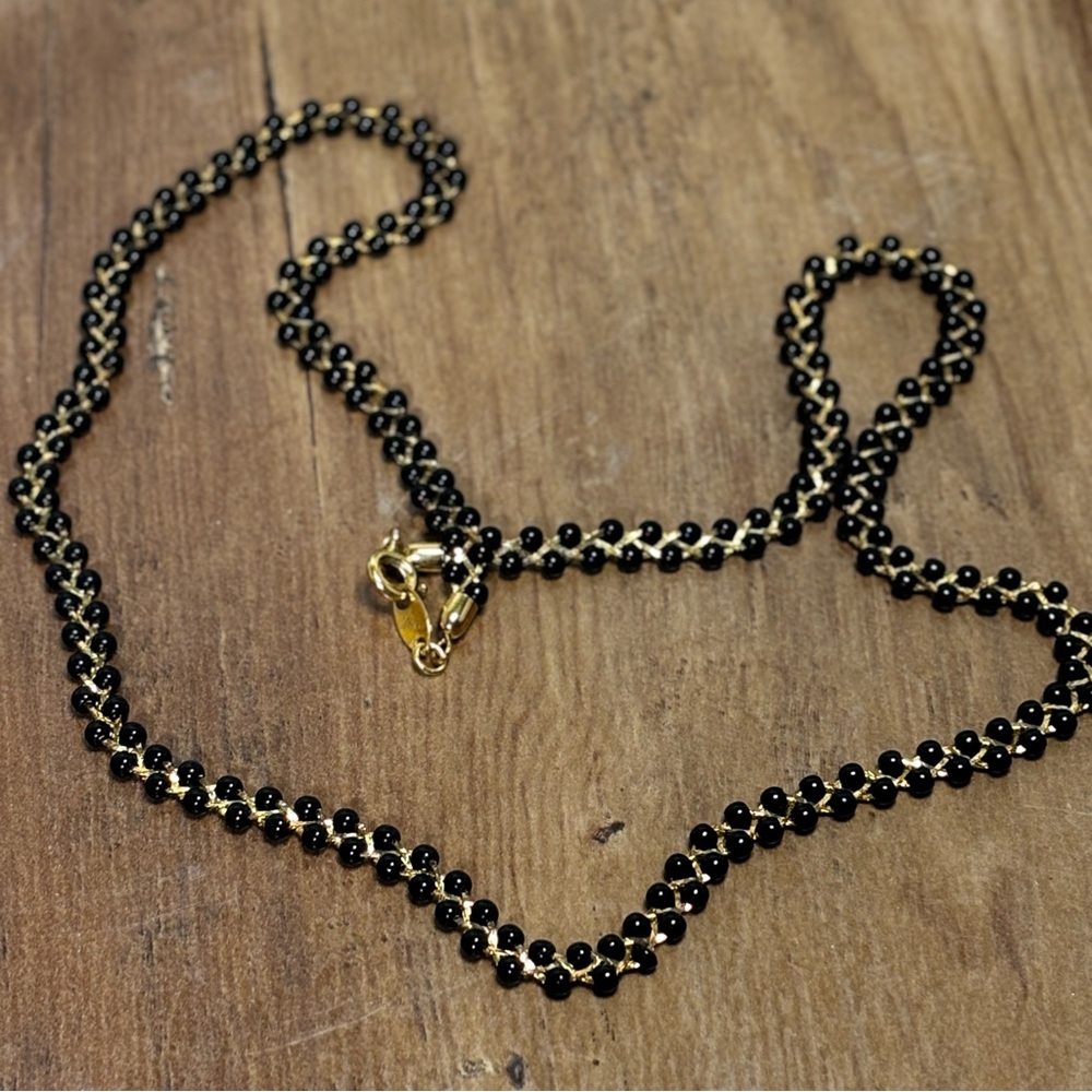 Stunning vintage Trifari goldtone braided necklace with dainty black seed beads